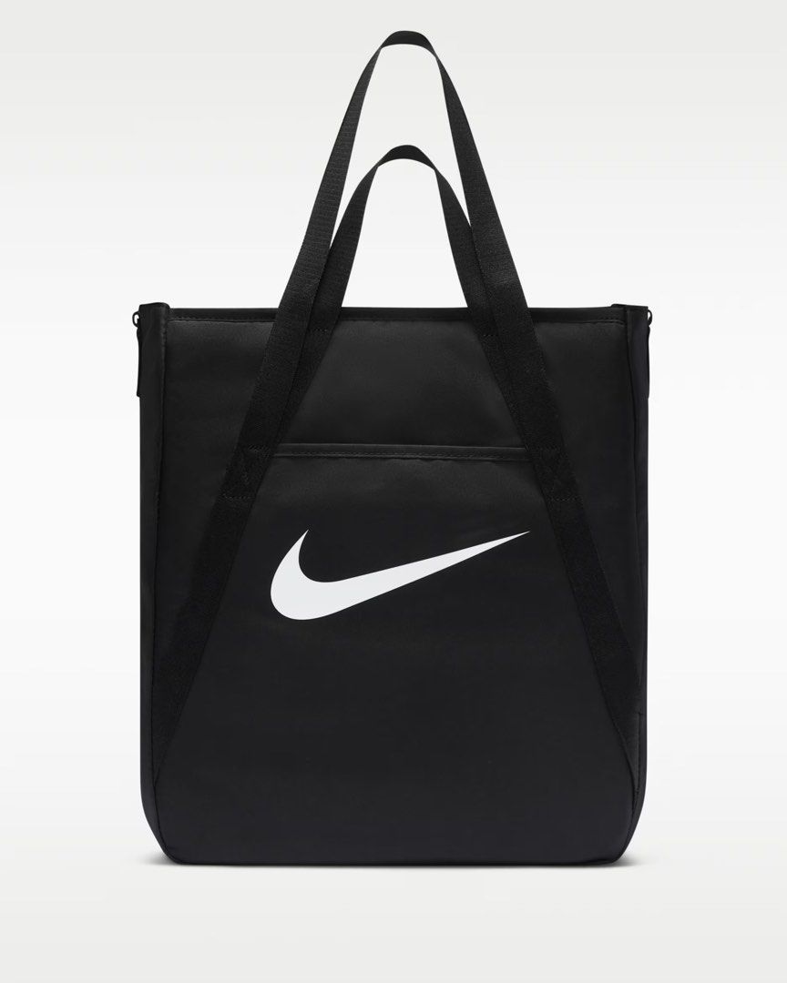 Nike Gym Tote (28L) Authetic (Category: Tote Bags) located in Bulacan. Submitted by hilligna (Listing ID 1432470037, Image 2). Description: Brandnew No matter what your training journey is, this tote is made to handle it. Multiple deep pockets line the inside of this bag, both open and zipped for extra security. The front and back features pockets for the small things you want easy access to. And, the size of this tote is deceptive—the sides feat