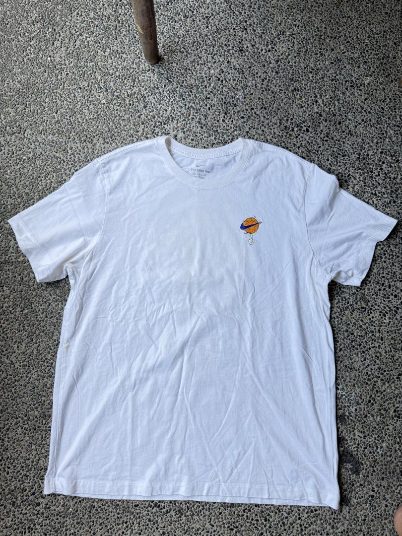 Nike The Nike Tee Tune Squad XL (Category: Tshirts & Polo Shirts ) located in Dinalupihan. Submitted by thrift.trips (Listing ID 1432565745, Image 1). Description: - Nike Tune Squad T-shirt - Size: XL - Made in Vietnam - Features Tune Squad graphic on the back - Small graphic on the front - Nike logo visible - Crew neck - Length 30 - Width 23.