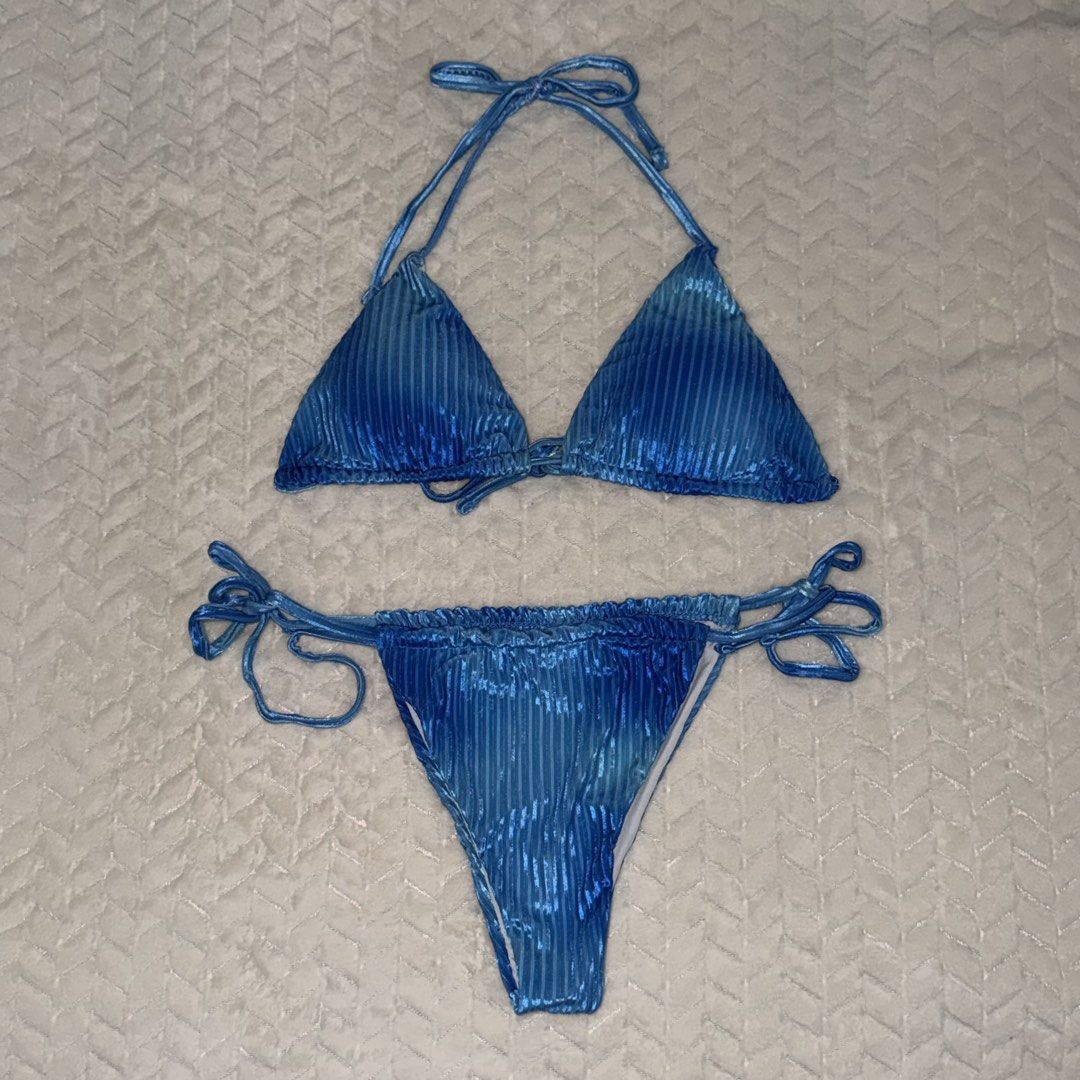 PRELOVED Two Piece Bikini Set Swimsuit (MEDIUM to LARGE) (Category: Bikinis & Swimsuits) located in Valenzuela. Submitted by declutterwithmrll (Listing ID 1432334252, Image 2). Description: - Preloved two-piece bikini swimsuits. - Best for Medium to Large sizes. - Various colors and styles: green textured, yellow textured, black, floral print, rust, blue floral, and blue striped. - DM me for more pictures of the swimsuit! For reference, I am mid-
