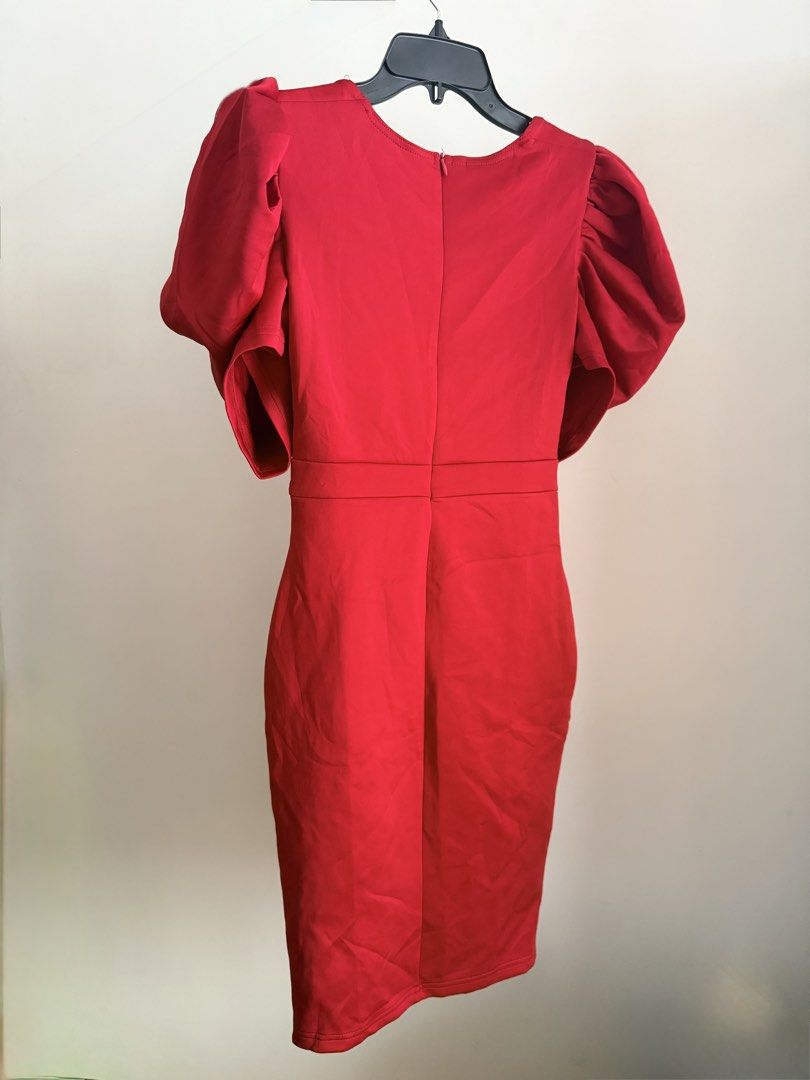 Red Puff Sleeve Dress (Category: Dresses) located in Cebu City. Submitted by dr_marsh (Listing ID 1432439031, Image 3). Description: Used once only for photoshoot Stunning red dress with puff sleeves, fitted silhouette, square neckline, and side slit. Features a fitted waist and back zipper. Ideal for special events..