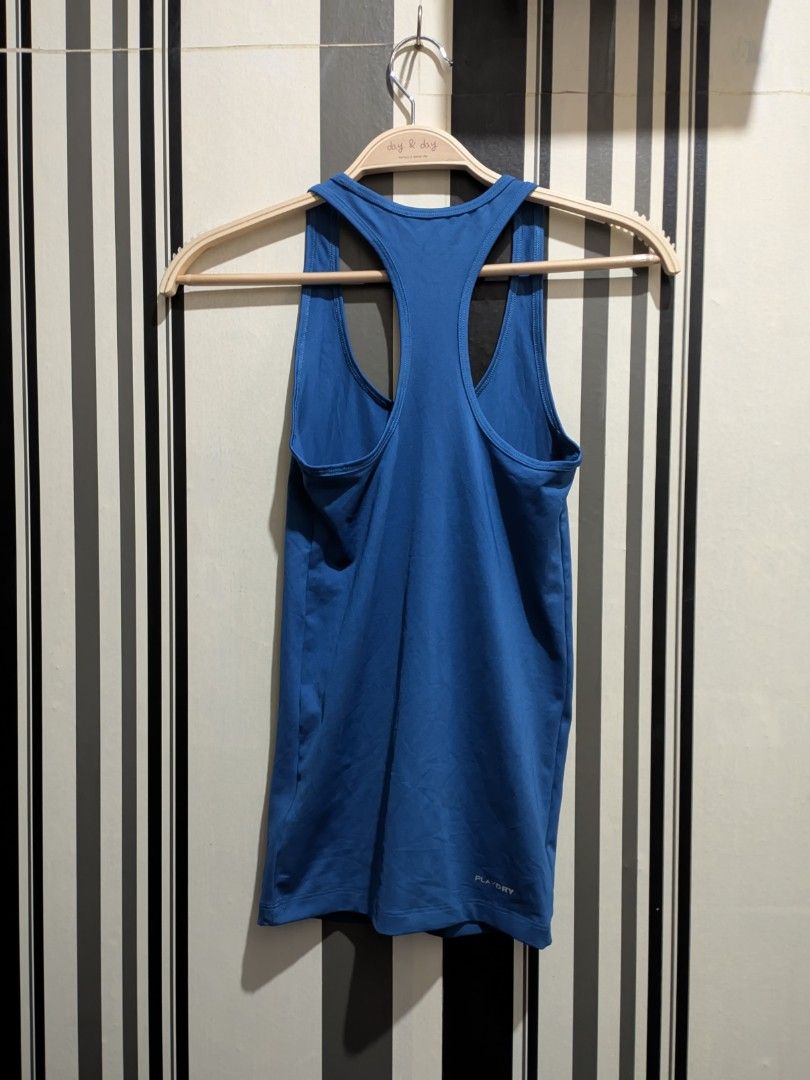 Reebok Playdry Blue Tank Top (Category: Activewear) located in Quezon City. Submitted by retrocycles (Listing ID 1432424757, Image 2). Description: Reebok Playdry tank top - Solid blue color - size XS - Lightweight polyester material - Ideal for workouts, running or casual wear.