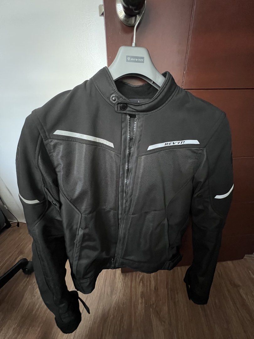 REV'IT! Motorcycle Jacket - Black - Size L (Category: Coats, Jackets and Outerwear) located in Angono. Submitted by itemswelove (Listing ID 1432418218, Image 1). Description: For Sale: - REV'IT! Black Motorcycle Jacket Airwave 3 - ORIGINAL bought from MotoMarket - For Men - Size: L - Reflective stripes on front, back, and sleeves - Zipper closure - Button collar - Mesh panel on front and back - REV'IT! logo on chest, back, and sleeves Protector p