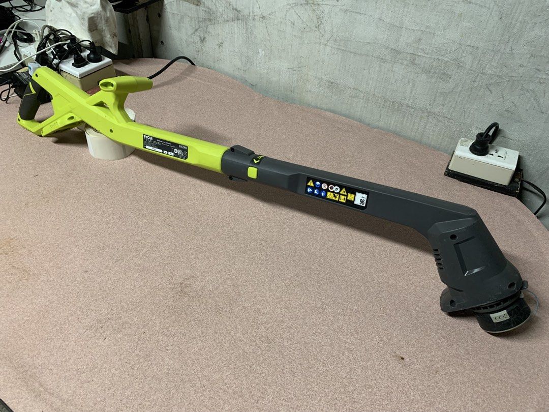Ryobi ONE+ EasyEdge Cordless String Line Trimmer working but No Battery (18v) (Category: Grass Mowers & Trimmers) located in Paranaque City. Submitted by seb_trading (Listing ID 1432545194, Image 2). Description: - Ryobi ONE+ EasyEdge string trimmer - Adjustable handle for comfortable use - Rotating head for easy edging - Battery-powered (battery not included) - Green and black color ISSUE: no battery, missing head shroud but working condition la