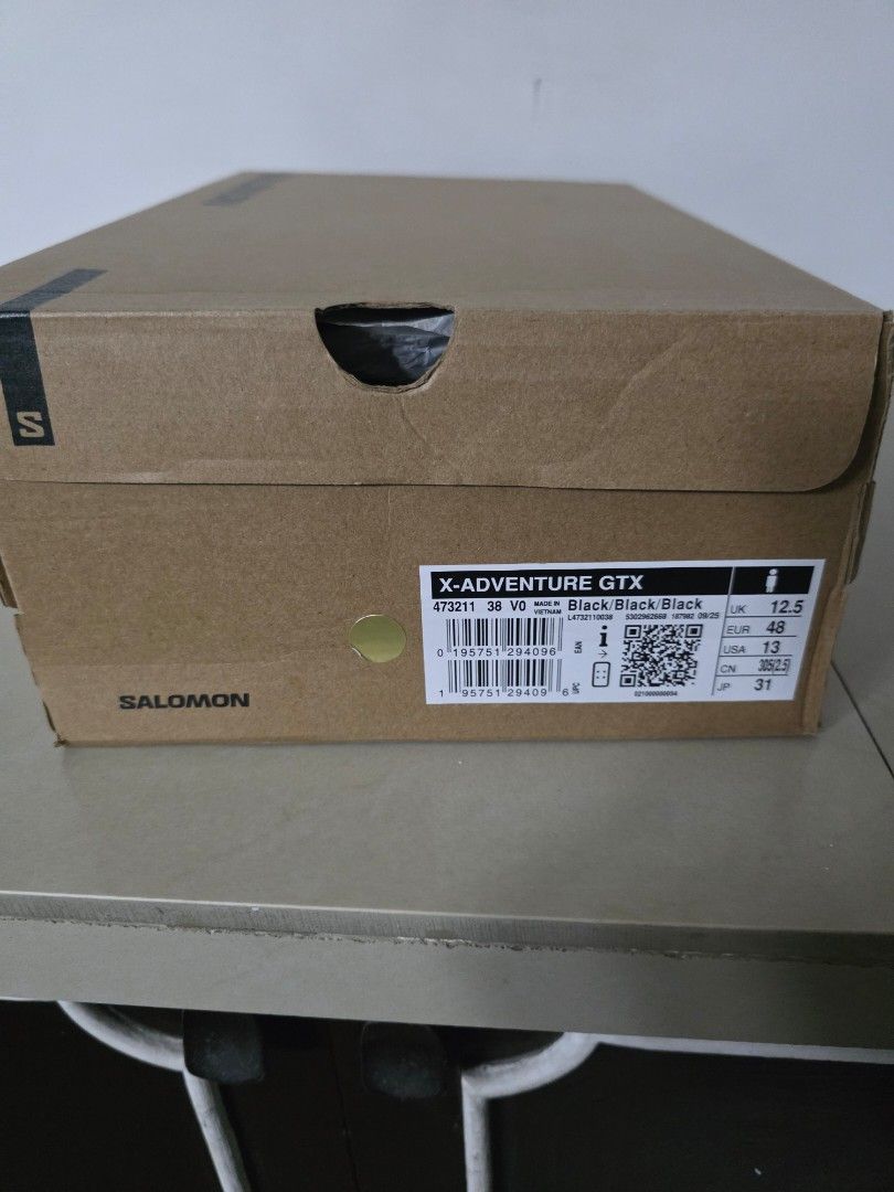 Salomon X-Adventure GTX Black (Category: Sneakers) located in Manila. Submitted by merinomigu76662 (Listing ID 1432442901, Image 3). Description: - Salomon X-Adventure GTX shoes - Color: Black - Size: US 12.5 / EUR 48 / CM 31 - Includes original box - Lace-up closure - Durable sole - Salomon logo visible.