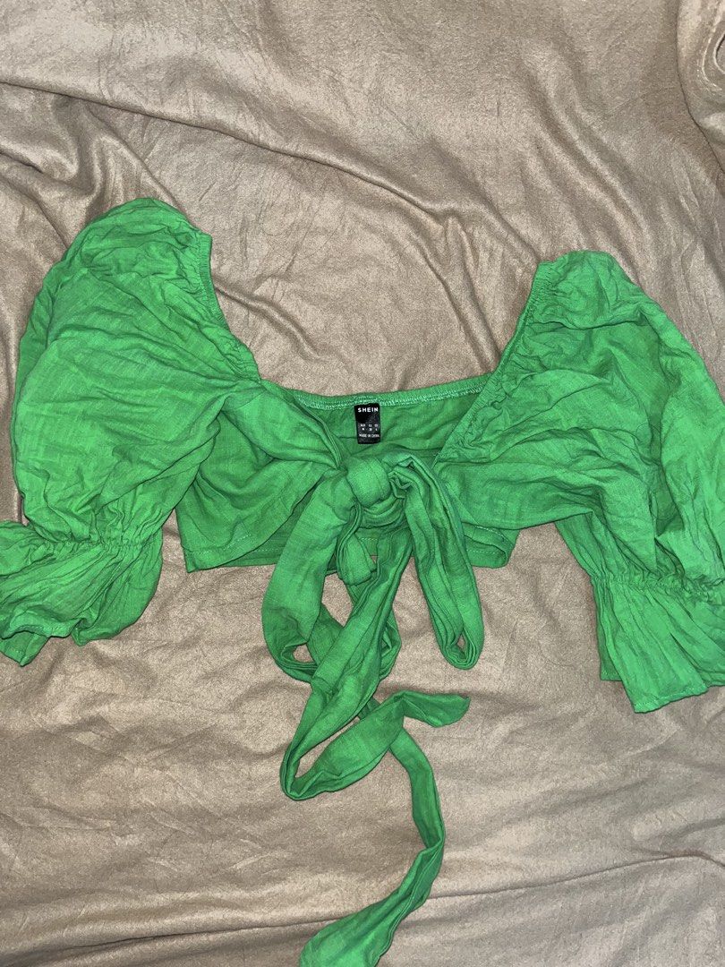 Shein Green Crop Top (Category: Others Tops) located in Manila. Submitted by quarishop21 (Listing ID 1432510187, Image 1). Description: NEVER BEEN USED OR WORN ‼️ - Shein crop top - Vibrant green color - Long sleeves with ruffled cuffs - Tie-front detail - Lightweight fabric - Perfect for warm weather - Trendy and versatile.