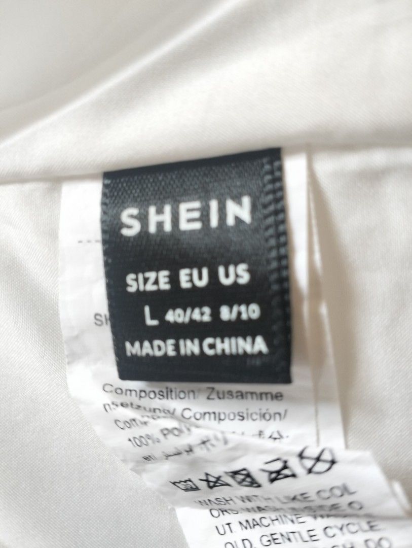 Shein White Embroidered Blouse (Category: Maternity wear) located in Makati City. Submitted by dearjane (Listing ID 1432411363, Image 2). Description: - Shein white embroidered blouse - Size: L (EU 40/42, US 8/10) - Made in China - Lightweight fabric.