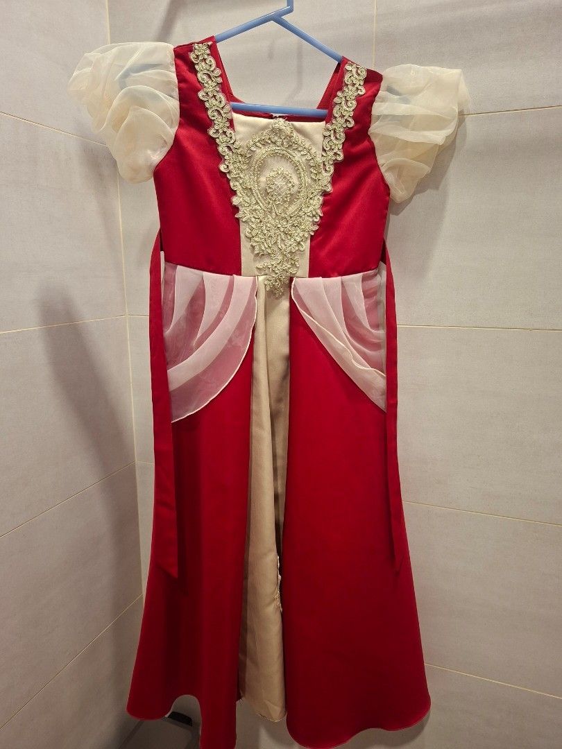 Snow White Costume Dress (Category: Dresses) located in Manila. Submitted by kitto222 (Listing ID 1432397534, Image 2). Description: - Snow White costume dress for children. - Features a red bodice. - Includes white puff sleeves. - Has a long skirt. - Ideal for dress-up play. - Great for themed parties..