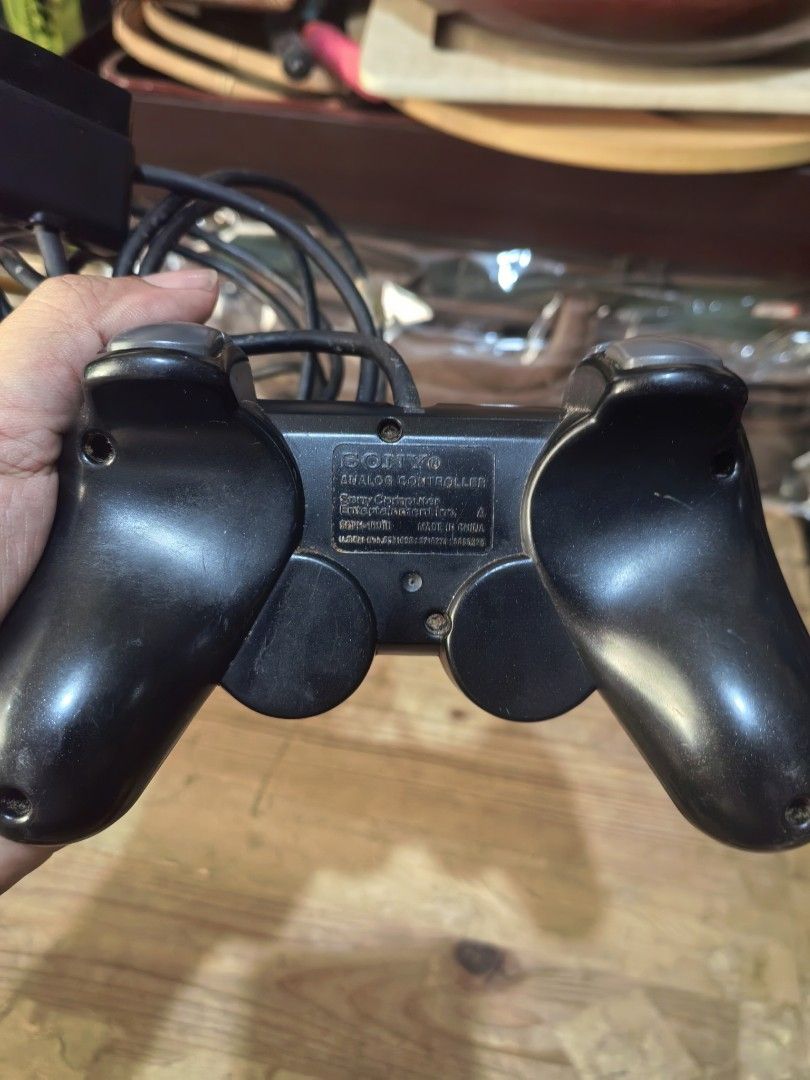 Sony PlayStation 2 DualShock 2 analog controller (Category: Controllers) located in Cebu City. Submitted by dudes_villanueva (Listing ID 1432398335, Image 3). Description: Sony PlayStation 2 DualShock 2 analog controller Model SCPH-10010. 📌 Untested. Sold as Is. Has Taped Part on wire..