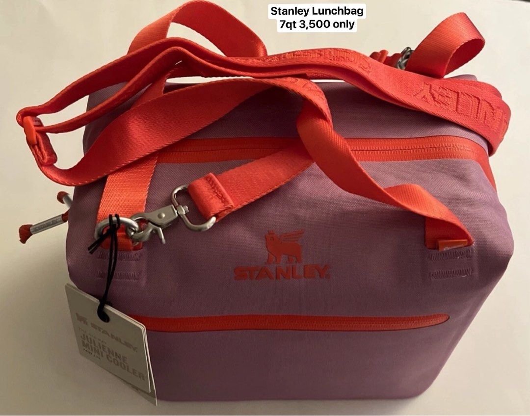 Stanley Julienne Mini Cooler Lunch Bag (Category: Food Organization & Storage) located in Caloocan City. Submitted by parkervane44220 (Listing ID 1432585610, Image 3). Description: - Stanley Julienne Mini Cooler - Keeps food and drinks cold - Features: - Zip closure - Top handle - Detachable shoulder strap - Sleek design - Stanley logo - Available in various colors.
