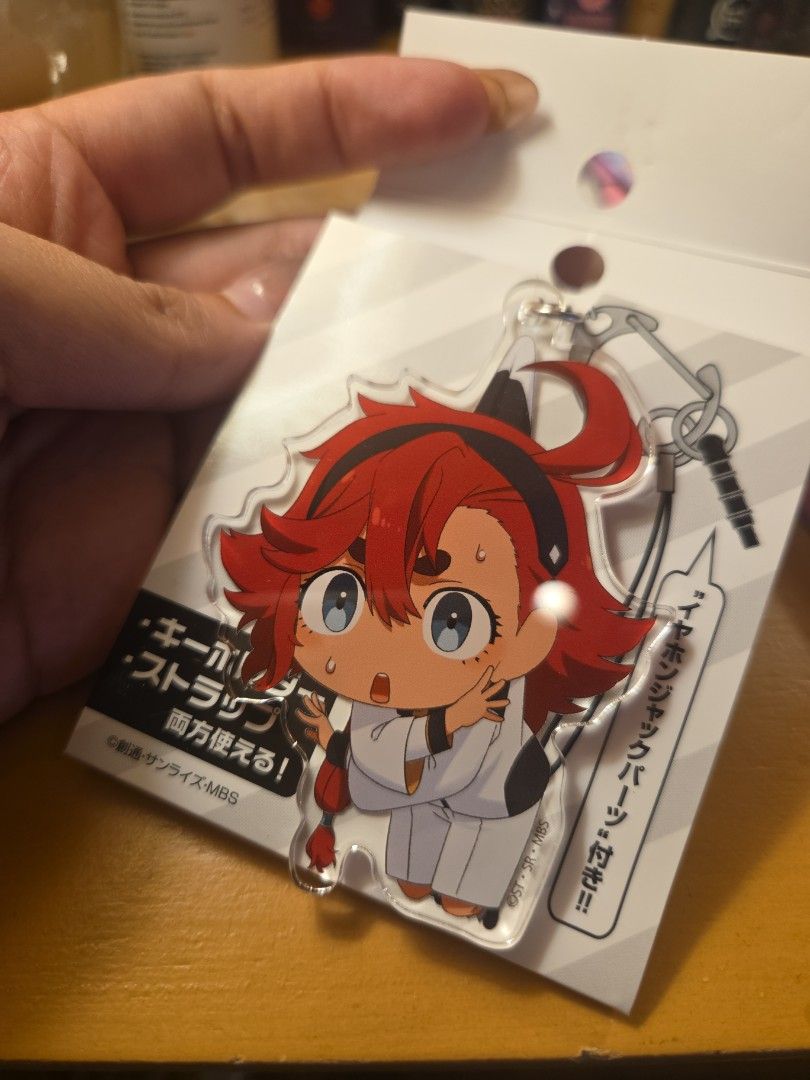 Suletta Witch of Mercurt Gundam Anime Keychain (Category: Character Goods) located in Quezon City. Submitted by littlecampfirecorner (Listing ID 1432460502, Image 2). Description: - Still in original packaging - Made of clear acrylic - Bought from Japan.