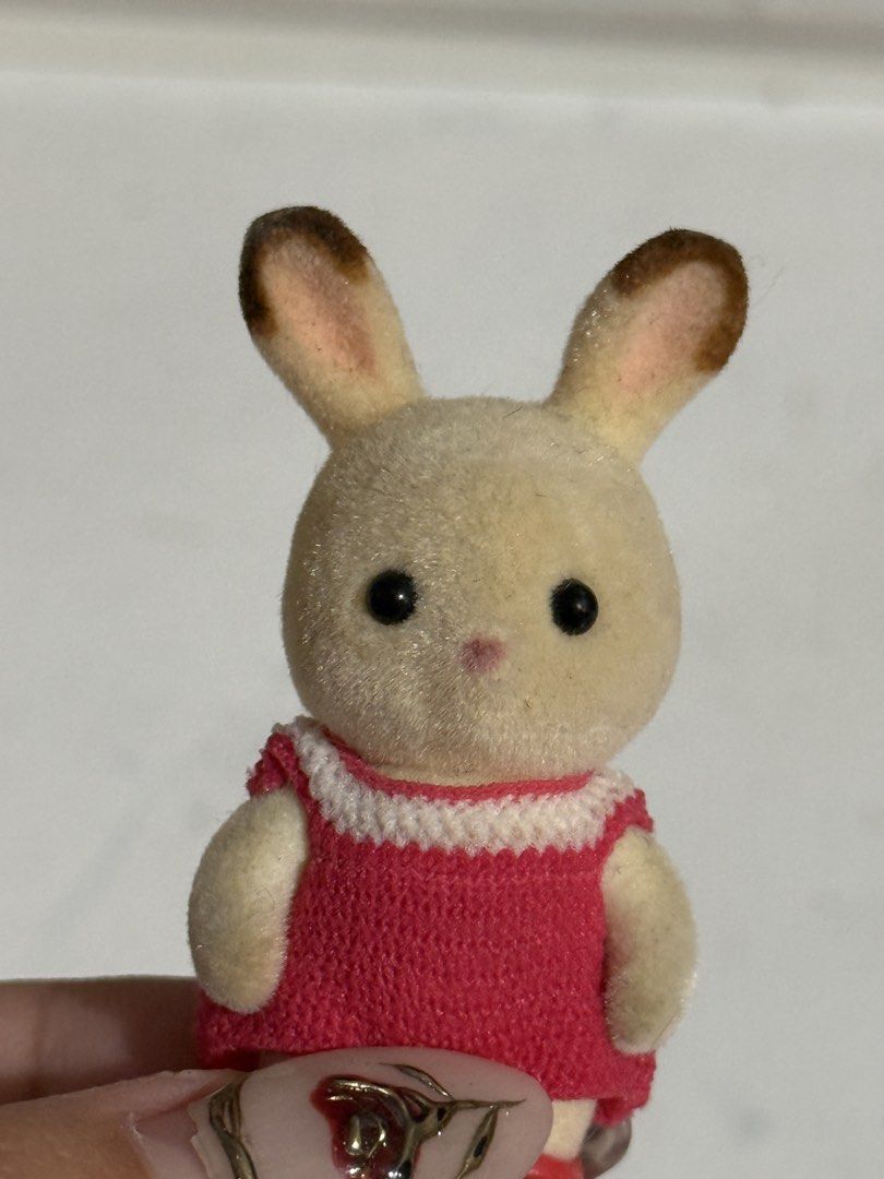Sylvanian Families Chocolate Rabbit Toddler w/ red crochet dress | school sports day (Category: Babies & Kids Fashion) located in Antipolo. Submitted by kiksy.closet (Listing ID 1432441576, Image 3). Description: Sylvanian Families Chocolate Rabbit Toddler w/ red crochet dress | school sports day - with dirt lints + scuffings around the ears - w/ crochet dress and generic shoes.