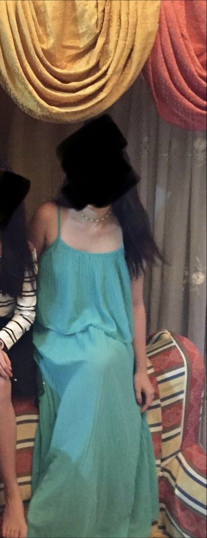 Teal/Turquoise Pleated Maxi Dress (Category: Dresses) located in Bulacan. Submitted by rks_closet (Listing ID 1430243911, Image 2). Description: Elegant maxi dress in a beautiful teal color. Features a pleated bodice and flowing skirt. Perfect for special occasions or a night out. The dress has thin straps and a flattering silhouette. It is a versatile piece that can be dressed up or down..