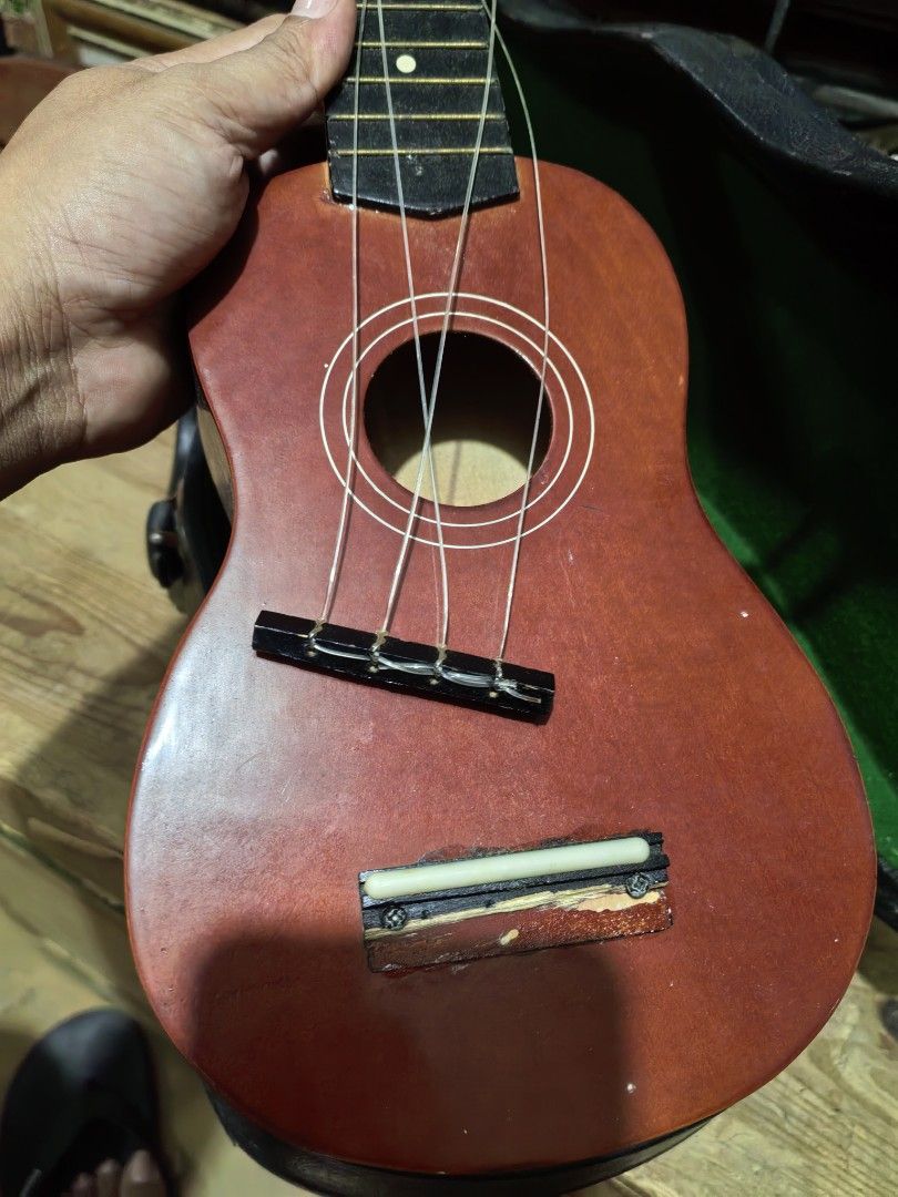 Ukelele with Case (Category: Musical Instruments) located in Cebu City. Submitted by dudes_villanueva (Listing ID 1432396958, Image 3). Description: Ukelele with Case 📌 Visible Issue. For Repair Sold as Is Length: 20.5 in.