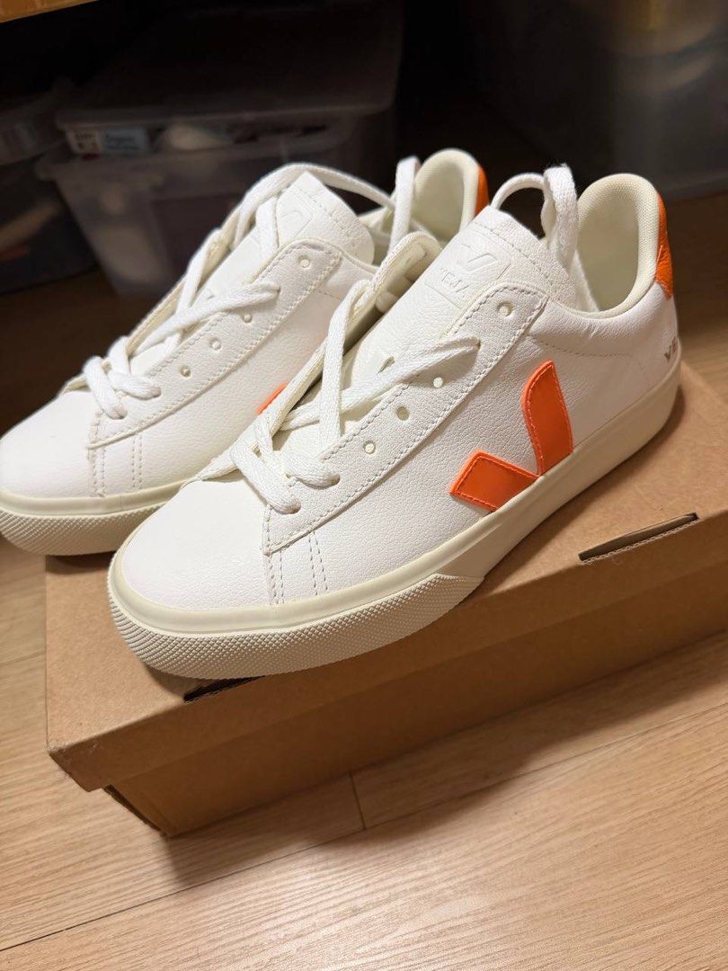 Veja Campo Leather Sneakers - White/Orange (Category: Sneakers) located in Paranaque City. Submitted by jjbmd (Listing ID 1432572162, Image 1). Description: ✨BRAND NEW-NEVER USED✨ - Kept in storage - Veja Campo sneakers - White leather with orange accents - White sole and laces - Size: EUR 38, UK 5, US 7, BR 36 - Made in Brazil - Comes with original box -Bought for 8k+, selling low already slightly negotiable.