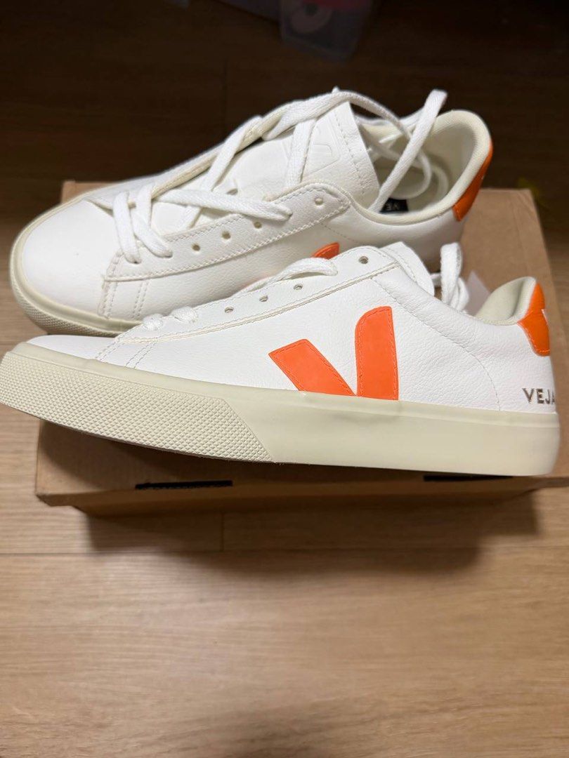 Veja Campo Leather Sneakers - White/Orange (Category: Sneakers) located in Paranaque City. Submitted by jjbmd (Listing ID 1432572162, Image 2). Description: ✨BRAND NEW-NEVER USED✨ - Kept in storage - Veja Campo sneakers - White leather with orange accents - White sole and laces - Size: EUR 38, UK 5, US 7, BR 36 - Made in Brazil - Comes with original box -Bought for 8k+, selling low already slightly negotiable.