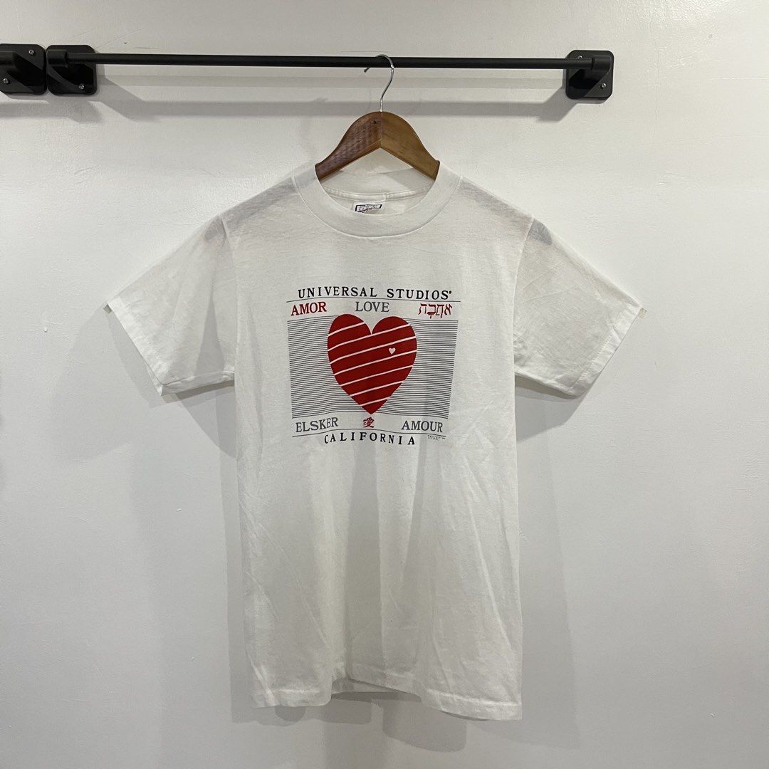 Vintage 80's Universal Studios Love Shirt (Category: Tshirts & Polo Shirts ) located in Calamba. Submitted by barraxarchive (Listing ID 1432558477, Image 1). Description: Size on tag: Medium (shrunk) Width: 17' Length: 27' Single stitch all over No issues Excellent Condition 🏷️ ₱380 📍 Calamba, Laguna.