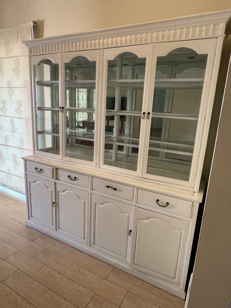 White Dining Display Cabinet with Glass Doors (Category: Shelves, Cabinets & Racks) located in Manila. Submitted by mads55667 (Listing ID 1432511157, Image 1). Description: Dining Room Cabinet/Buffet Fair condition - With a few missing/loose handles, drawers which are not as easy to pull out, cabinet doors not fully closing 72x19xH78.5 - Elegant white display cabinet - Features glass-door sections on top - Includes solid-door sections with drawer