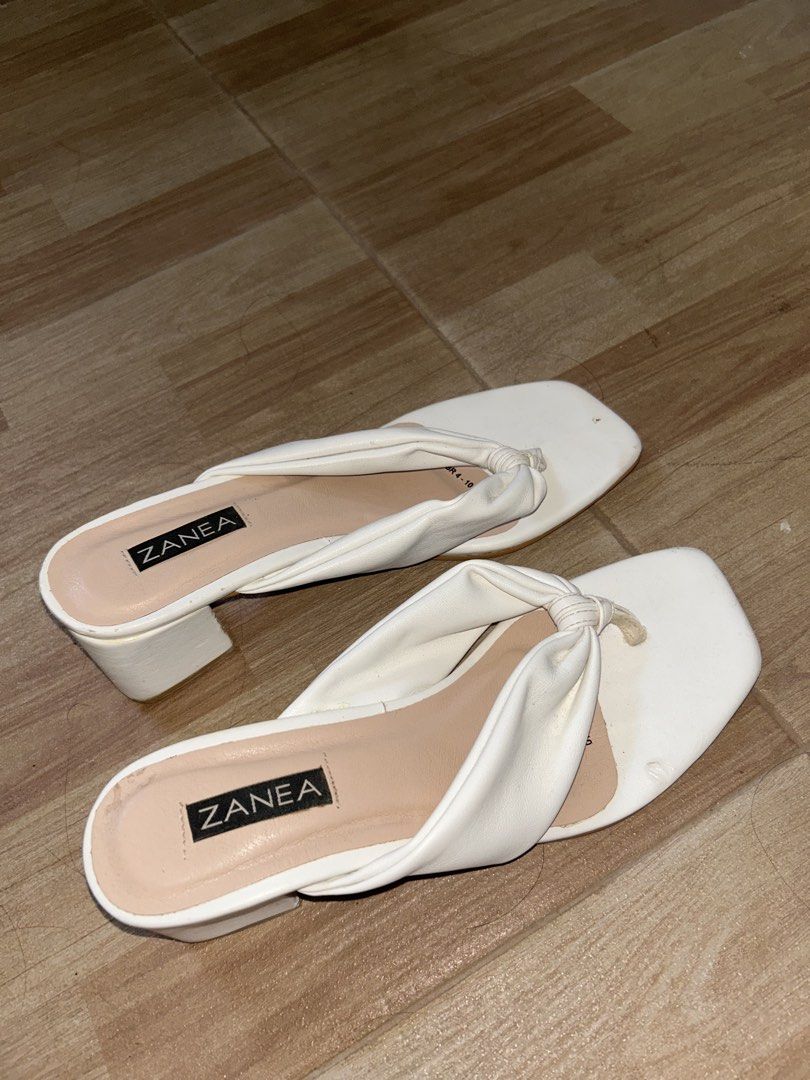 Zanea White Sandals (Category: Flats & Sandals) located in General Trias. Submitted by pepperreena (Listing ID 1432439184, Image 1). Description: -slightly used with minimal defects kita naman po sa picture if san banda di naman siya pansinin -need lang linisan ng maayos - need to declutter .