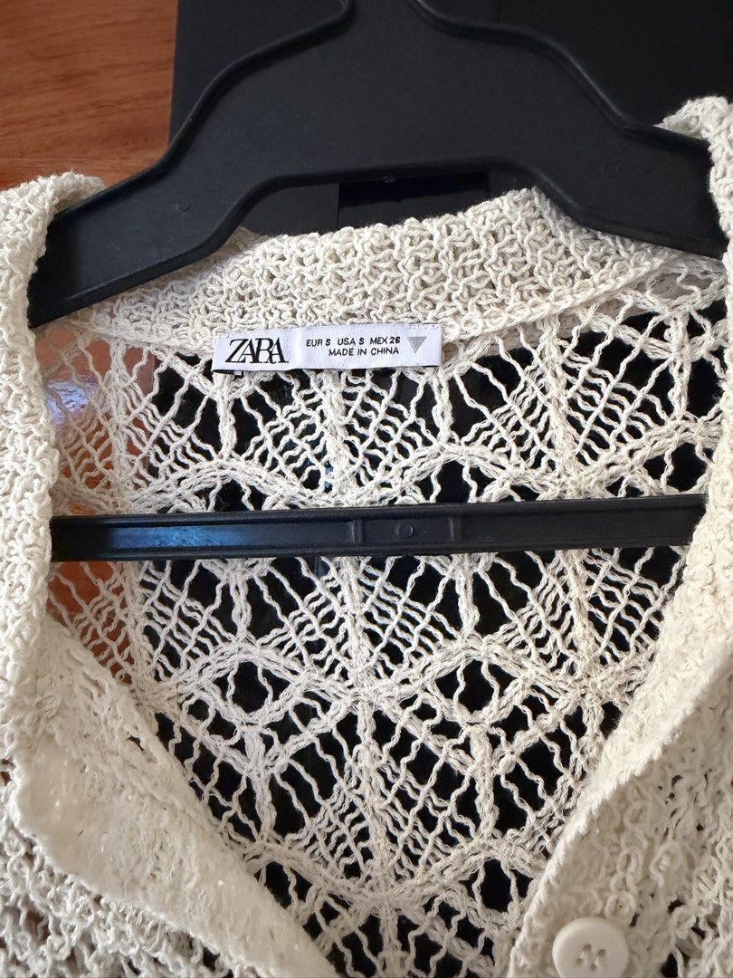 Zara Crochet Polo Top - Size S (Category: Blouses) located in Paranaque City. Submitted by krishamel (Listing ID 1432459140, Image 2). Description: - Zara cream crochet polo top - Size: S - Features a collared neckline - Short sleeves - Button-down front - Delicate crochet design - Used once.
