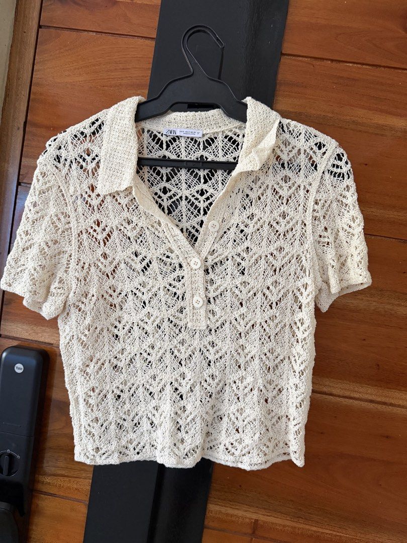 Zara Crochet Polo Top - Size S (Category: Blouses) located in Paranaque City. Submitted by krishamel (Listing ID 1432459140, Image 1). Description: - Zara cream crochet polo top - Size: S - Features a collared neckline - Short sleeves - Button-down front - Delicate crochet design - Used once.