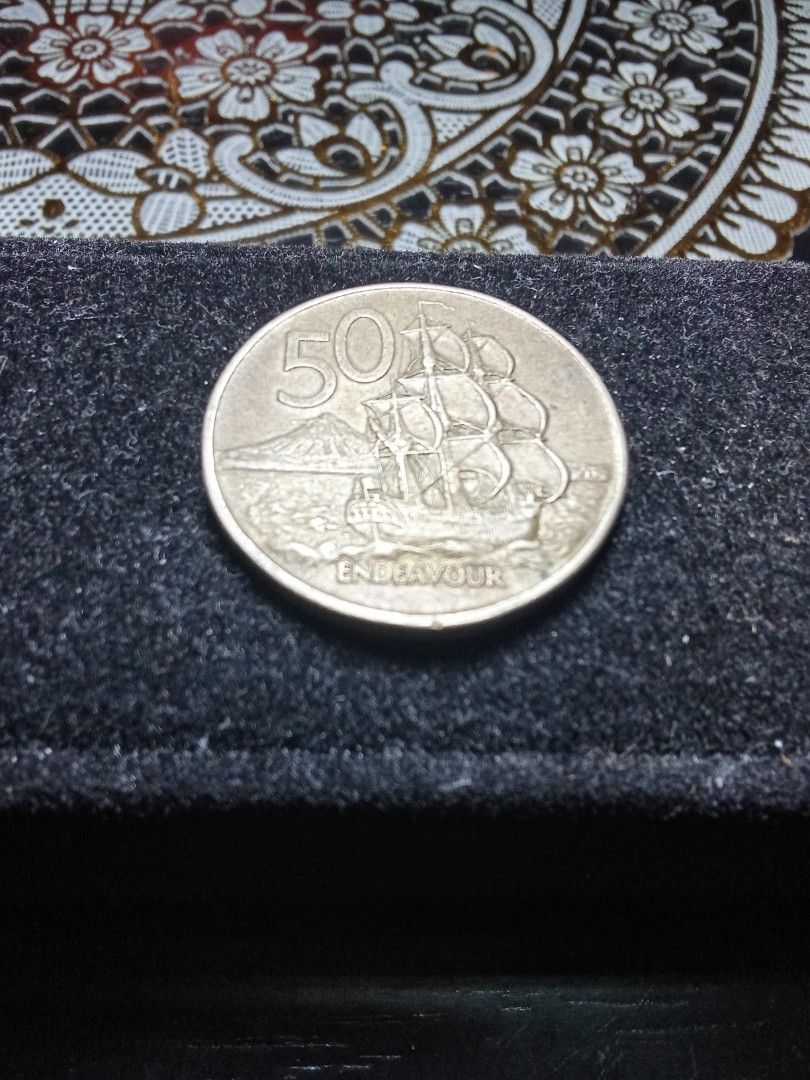 Mid - Century - Queen Elizabeth - 50 Cent Coin. (Category: Currency) located in Valenzuela. Submitted by jmfurniture (Listing ID 1432599597, Image 2). Description: Mid - Century - Coin. 50 Cent Coin Queen Elizabeth 11. 1974 - Mid - Century - Coin. One Pieace Old Coin. Loc: Valenzuela City For pick up or delivery.Delivery fee will be shouldered by the buyer..