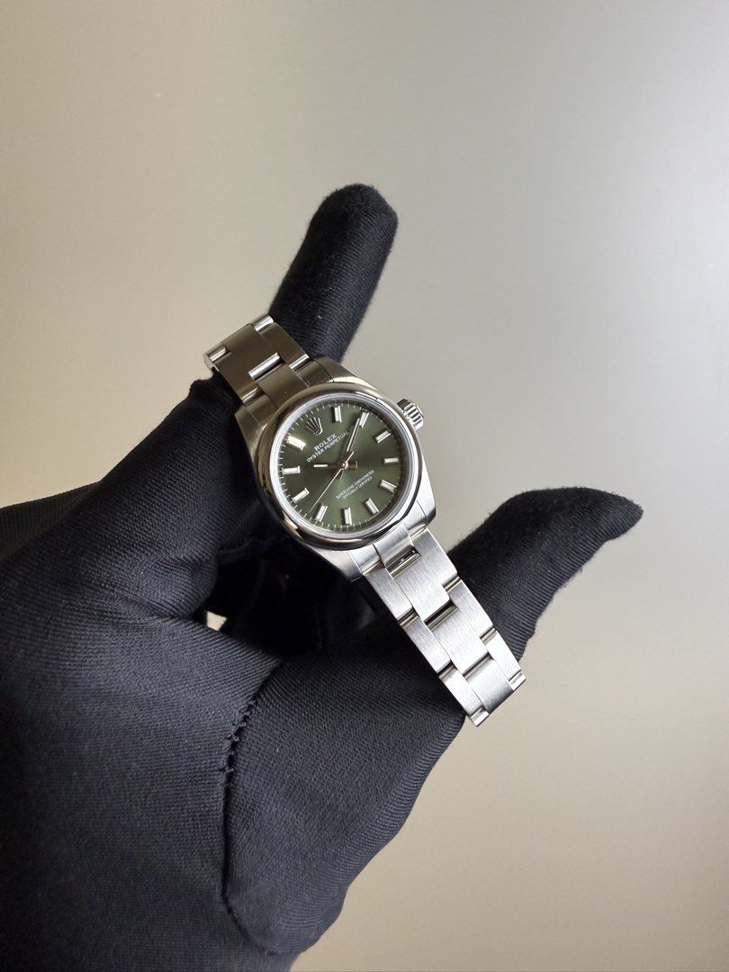 [ LNIB OLIVE 🫒 ] Rolex 176200 Oyster Perpetual 26mm Olive Green Dial OP26 (Category: Watches) located in Singapore. Submitted by bayfort (Listing ID 1432650241, Image 2). Description: Subscribe to Bayfort Tele-gram Community for Exclusive Deals & Clearance Sales: https://bayfort.sg/tg Model: 176200 Dated: 2015 Case Size: 26mm Comes with: Full Set with White Tag (less 1 link) Condition: Lightly Used, Very Mint Condition Original Box: Yes Original