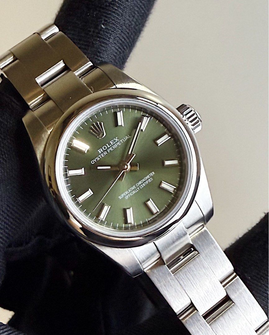 [ LNIB OLIVE 🫒 ] Rolex 176200 Oyster Perpetual 26mm Olive Green Dial OP26 (Category: Watches) located in Singapore. Submitted by bayfort (Listing ID 1432650241, Image 1). Description: Subscribe to Bayfort Tele-gram Community for Exclusive Deals & Clearance Sales: https://bayfort.sg/tg Model: 176200 Dated: 2015 Case Size: 26mm Comes with: Full Set with White Tag (less 1 link) Condition: Lightly Used, Very Mint Condition Original Box: Yes Original