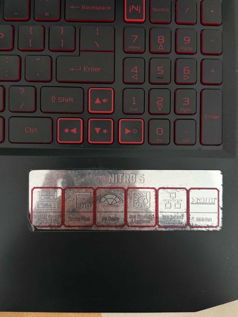 Acer Nitro 5 Gaming Laptop (Category: Laptops & Notebooks) located in Manila. Submitted by jenikago (Listing ID 1432638089, Image 2). Description: - Acer Nitro 5 gaming laptop - Full HD 1080p display - Red backlit keyboard - AMD Ryzen 5 processor - Radeon graphics - Multiple ports including HDMI - Stylish black and red color scheme.