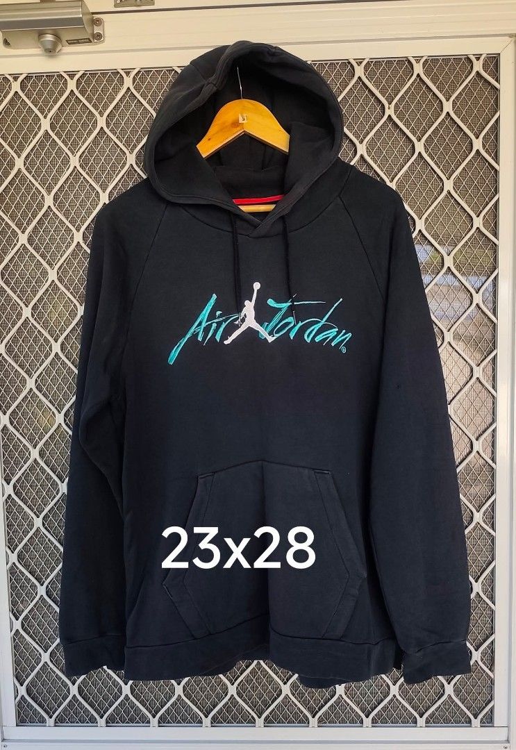 Air Jordan Hoodie Black (Category: Coats, Jackets and Outerwear) located in Baliuag. Submitted by gabtaz (Listing ID 1432790704, Image 1). Description: - Black Air Jordan hoodie - Teal and white "Air Jordan" logo - Front pocket - Hood with drawstring - Size: 23x28 - Perfect for casual wear.