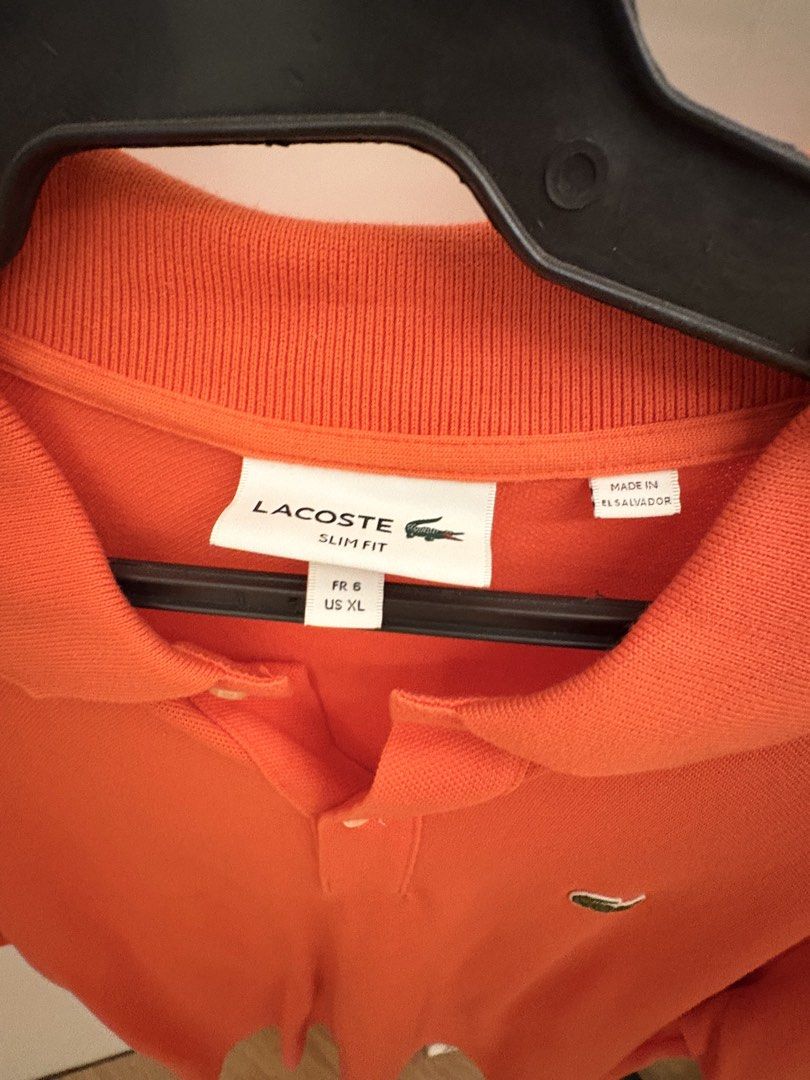 Authentic Lacoste Slim Fit Polo Shirt - Orange (Category: Tshirts & Polo Shirts ) located in Cainta. Submitted by Hobbyduck_Shop (Listing ID 1432740340, Image 3). Description: WTS/LFB - Authentic Orange Lacoste Slim Fit polo shirt - Size: US XL, FR 6 -Like new -Authentic.