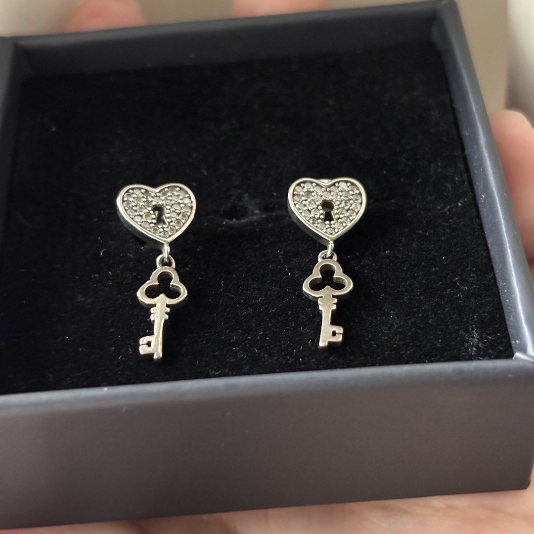 Authentic Silverworks S925 Sterling Silver Heart Key Dangling Dangle Drop Earrings (Category: Earrings) located in Quezon City. Submitted by vaultedlovecloset (Listing ID 1432654599, Image 2). Description: Help me declutter my silver collection that I barely use. Purchased this pair of earrings at Silverworks. Rarely used. No flaws. No missing stones. Unfortunately, I don’t have the official receipt. However, based on the markings, you can see th