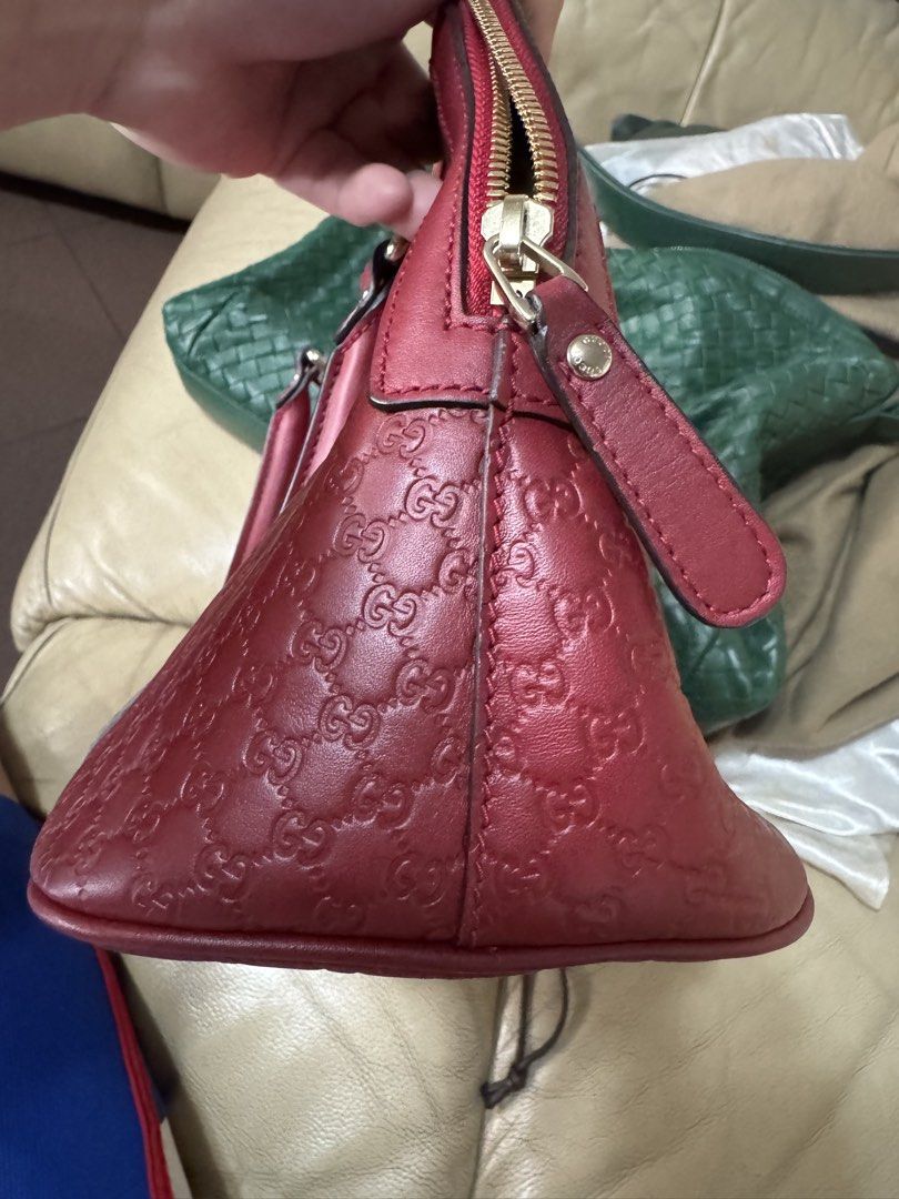Barely used authentic Gucci for sale! (Category: Luxury Bags & Wallets) located in Caloocan City. Submitted by marconinja (Listing ID 1432621652, Image 3). Description: - Gucci Microguccissima Dome bag - Beautiful red color - Features the iconic Microguccissima pattern - Includes dust bag - Stylish and timeless design.