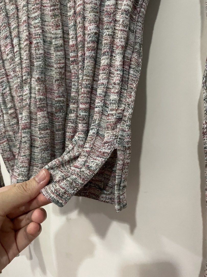 Bershka Ribbed Long Sleeve Top (Category: Longsleeves) located in Makati City. Submitted by Pinksisters (Listing ID 1432706241, Image 3). Description: Bershka long sleeve top with a ribbed texture. Features a round neckline and flared sleeves. The top has a split detail on the sides. The color is a mix of gray, white, and maroon. The size is medium but fits smaller sizes..