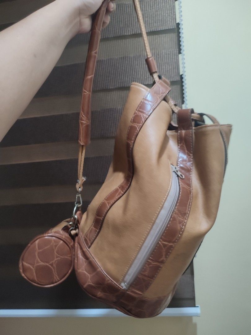 Brown Leather Hand bag with crocodile embossed trim (Category: Shoulder Bags) located in Dasmarinas. Submitted by sbtt_ (Listing ID 1432658205, Image 2). Description: Handmade bag with adjustable strap and matching pouch. Made with full leather.
