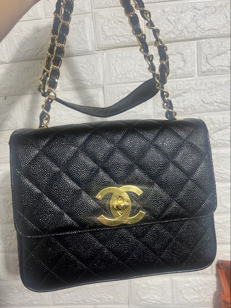 Chanel Vintage Caviar Flap Bag (Category: Luxury Bags & Wallets) located in Manila. Submitted by jonalyngal75237 (Listing ID 1432705239, Image 2). Description: - Authentic Vintage Chanel Caviar Flap Bag - very rare vintage bag - Color: Black - Hardware: Gold-tone - Strap: Gold-tone chain - Closure: Iconic CC turn-lock - Interior: Burgundy leather lining - Design: Quilted - Additional: Chanel logo zipper pull - with legit grails - .