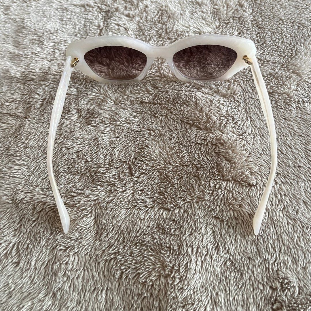 Charles & Keith Onyx Cat-Eye Sunglasses (Category: Sunglasses & Eyewear) located in San Juan City. Submitted by _ands_ (Listing ID 1432758665, Image 2). Description: - Color: Pearl - Bnew; never used (no tags) - No flaws .