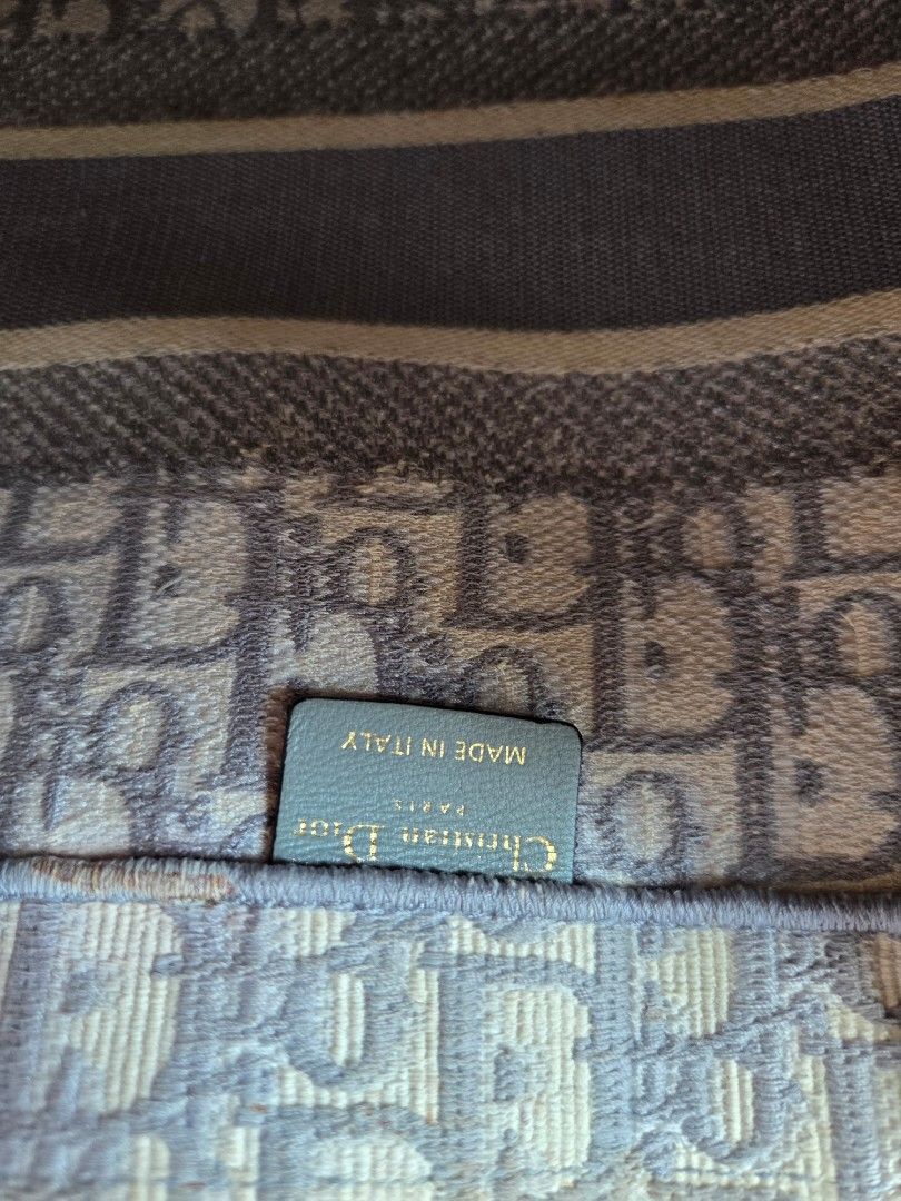 Christian Dior Booktote (Category: Luxury Bags & Wallets) located in Quezon City. Submitted by shop.mar.go (Listing ID 1432621022, Image 2). Description: comes with dust bag and paper bag only price is slightly negotiable, kindly make an offer if your sure with ur price..