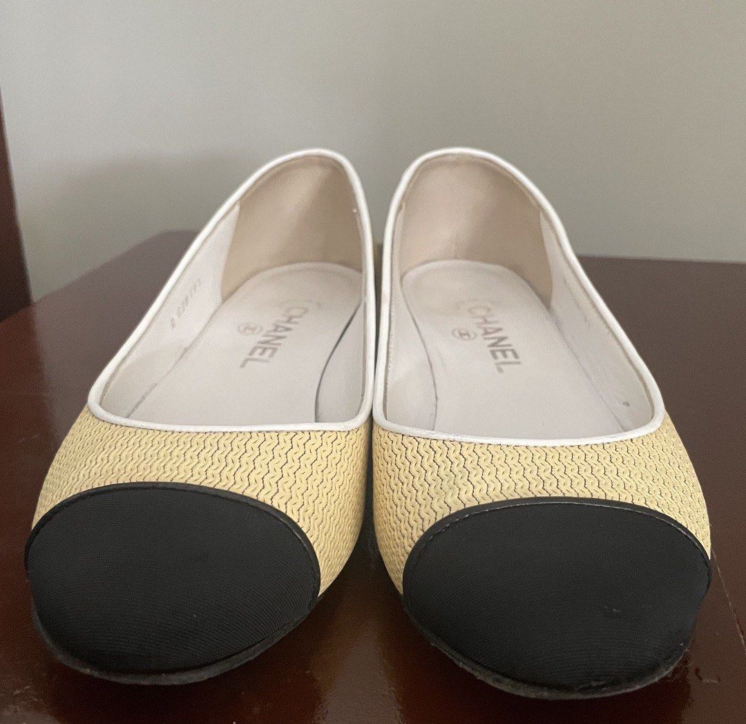 Classy Chanel Flats - Size 38.5 (Category: Flats & Sandals) located in Cebu City. Submitted by mom_yvoh (Listing ID 1419149732, Image 3). Description: - Guarsnteed Authentic Chanel flats - Size: 38.5 - Features: Yellow woven upper, black cap toe and sole - Chanel logo visible on insole and heel - Made in Italy - Serial number: A G28191 - Very comfortable to wear -Used but well loved. Recently had a shoe spa -Heels recently replaced - last pic not