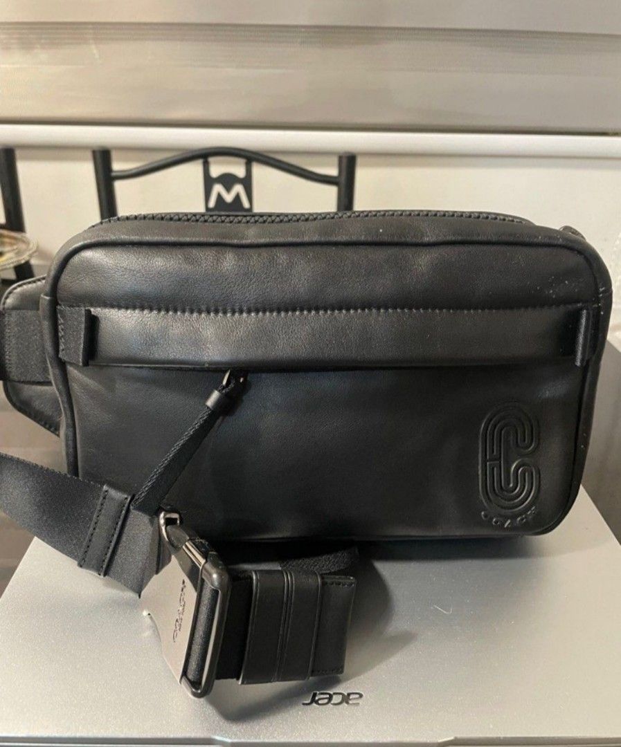 Coach Black Sling or Belt Bag (Category: Sling Bags) located in Rizal. Submitted by stobelly (Listing ID 1432723159, Image 1). Description: Original Coach Edge Belt/Body Bag Brand new,Never used. From California USA Actual pic posted May mga small dot lng na parang kagat ng langgamkaya im selling low. Please see last pic.