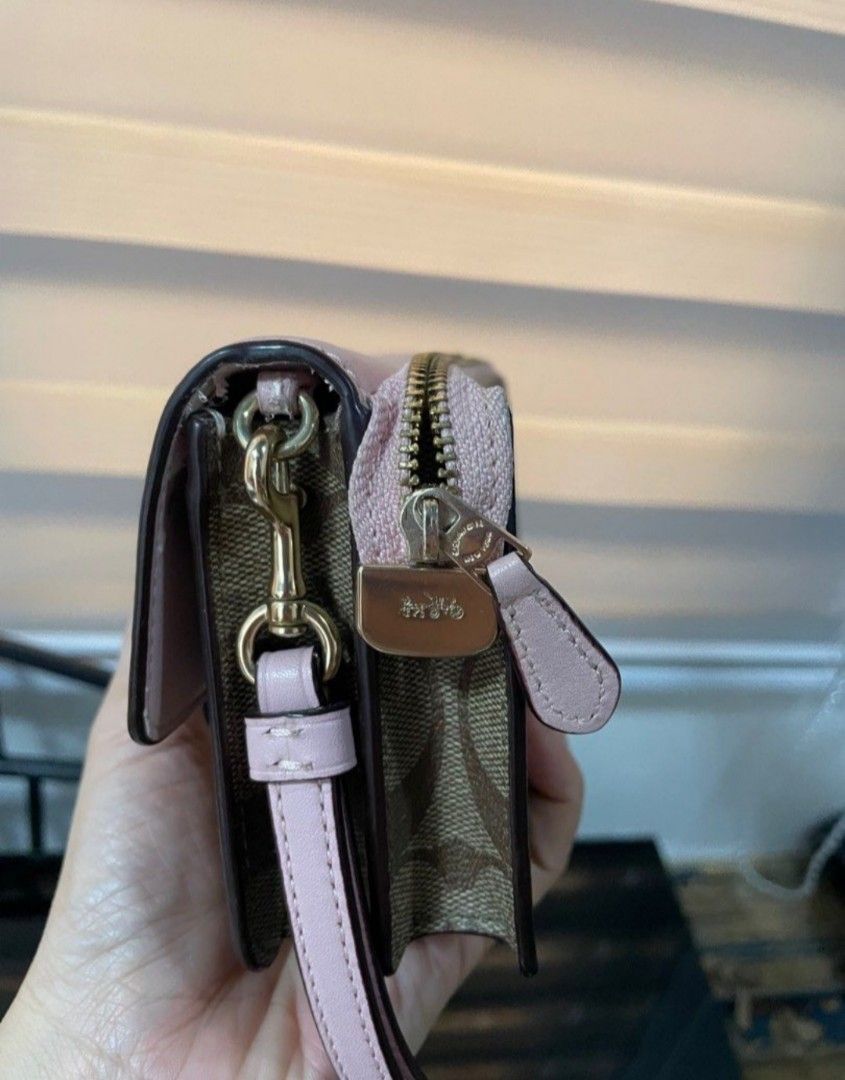 Coach Wristlet (Category: Luxury Bags & Wallets) located in Rizal. Submitted by stobelly (Listing ID 1432725812, Image 3). Description: Original Coach Wristlet Actual photo posted Issue: expired leather inside but all parts in almost new condition see last photo.