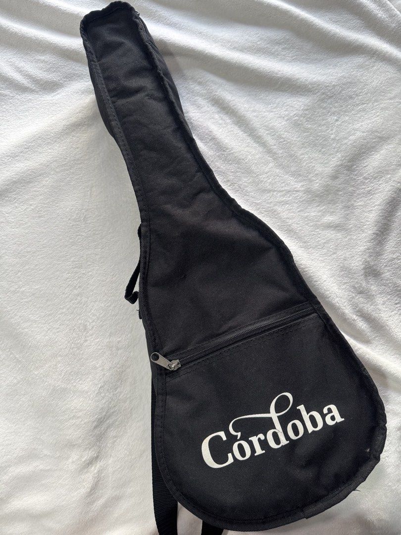 Cordoba Ukulele with Case (Category: Musical Instruments) located in Quezon City. Submitted by chrollo7 (Listing ID 1432664002, Image 2). Description: - Cordoba ukulele with a black carrying case - No issues, in good condition - Was taken care of very well - Bought for 5k - Makati-based.