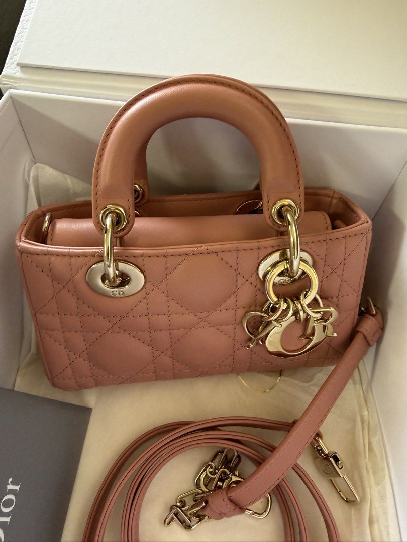 Dior D-Joy Micro Bag (Category: Luxury Bags & Wallets) located in Manila. Submitted by az.purse (Listing ID 1432751963, Image 2). Description: - Authentic Lady Dior Micro Bag - Beautiful blush color - Includes original box and dust bag - Features a top handle and detachable shoulder strap - Iconic Dior charms and quilted pattern - Gold-toned hardware -2022 purchased.