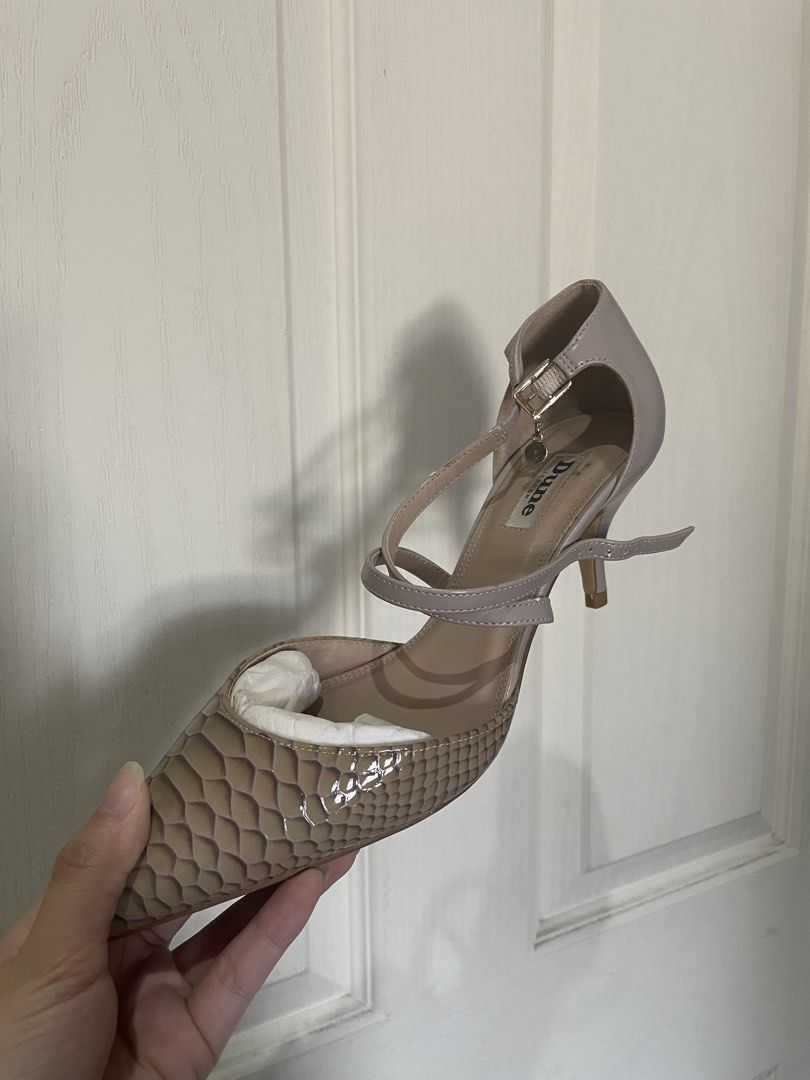 Dune London Courtlee Cross Strap Kitten Heels (Category: Heels) located in Bulacan. Submitted by declutterwithjcl_ (Listing ID 1432648638, Image 2). Description: - Dune London Courtlee heels - Mink-reptile design - Cross strap and kitten heel - Size 38 - Includes original box and spare heel tips - Original price: ₱5,450.00 - Perfect for any occasion -Used once (nakatambak nalang).