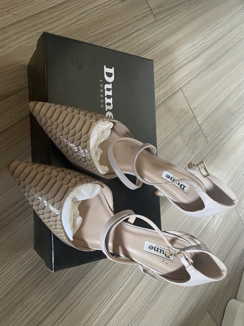 Dune London Courtlee Cross Strap Kitten Heels (Category: Heels) located in Bulacan. Submitted by declutterwithjcl_ (Listing ID 1432648638, Image 1). Description: - Dune London Courtlee heels - Mink-reptile design - Cross strap and kitten heel - Size 38 - Includes original box and spare heel tips - Original price: ₱5,450.00 - Perfect for any occasion -Used once (nakatambak nalang).