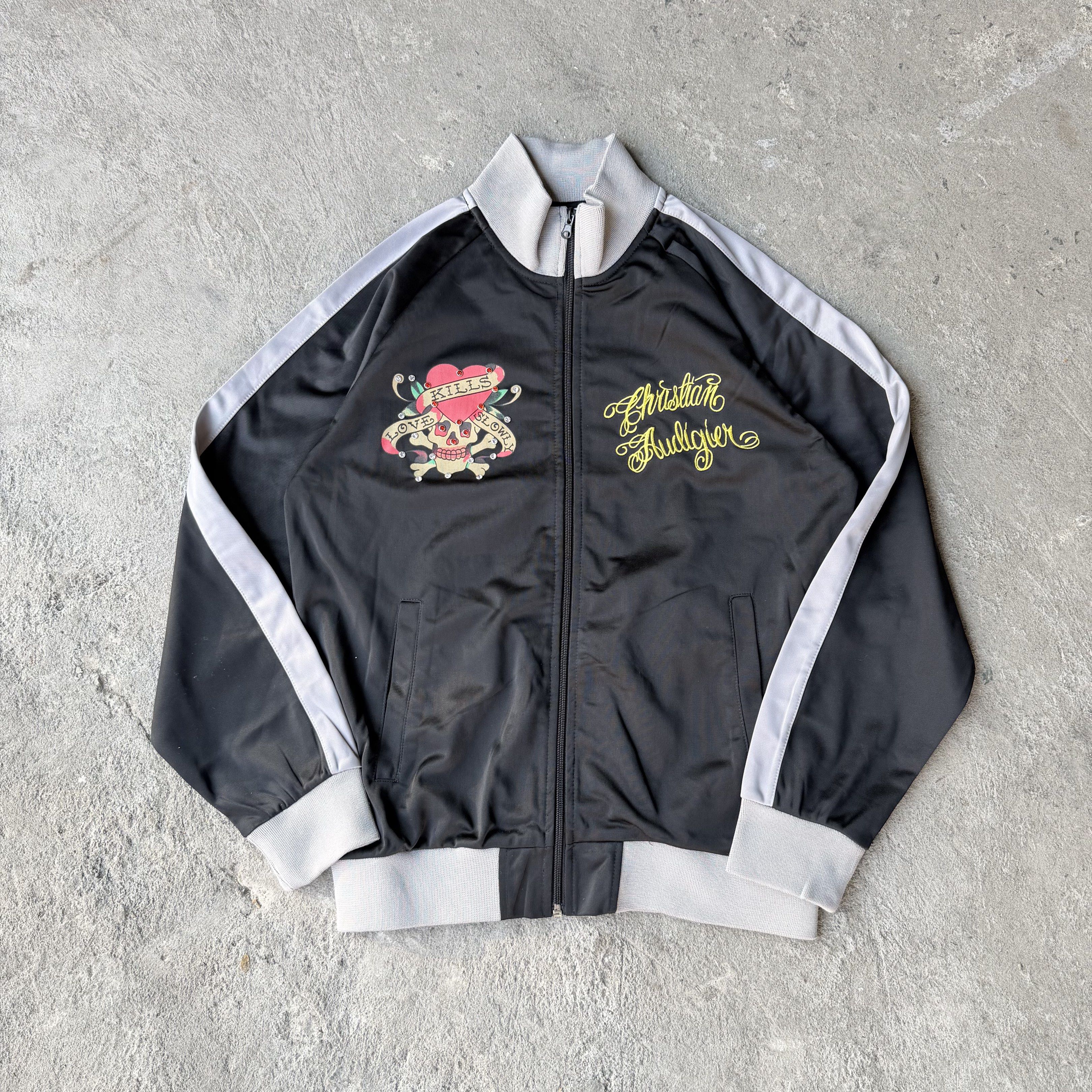 Ed Hardy Love Kill Skull Cubic Stone track jacket (Category: Coats, Jackets and Outerwear) located in Cavite. Submitted by shiro_____. (Listing ID 1432675543, Image 1). Description: For sale🔥 Ed Hardy Love Kill Skull Cubic Stone track jacket Size XL Length 26 Width 21 Excellent condition on its age Sign of usage only Still presentable.