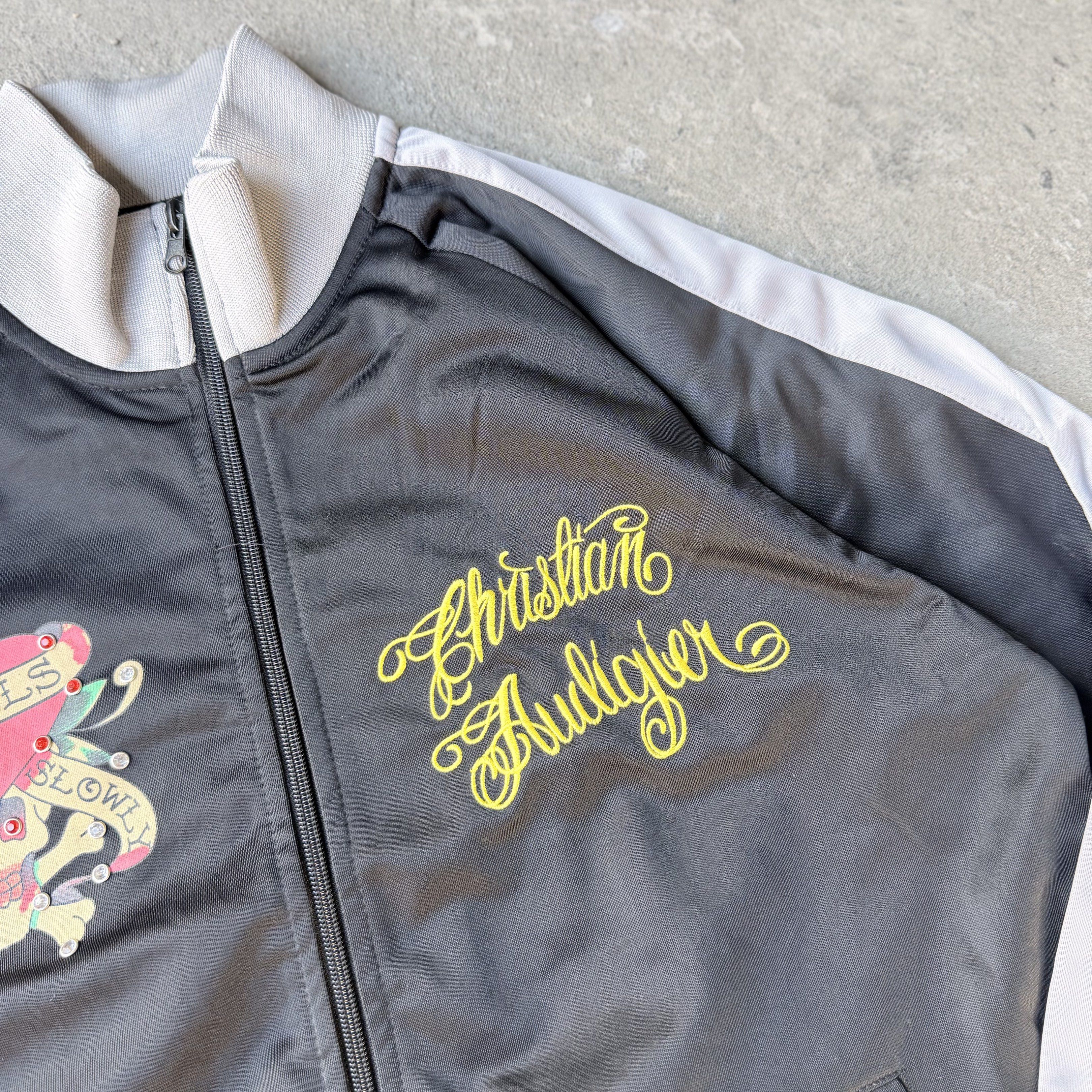 Ed Hardy Love Kill Skull Cubic Stone track jacket (Category: Coats, Jackets and Outerwear) located in Cavite. Submitted by shiro_____. (Listing ID 1432675543, Image 3). Description: For sale🔥 Ed Hardy Love Kill Skull Cubic Stone track jacket Size XL Length 26 Width 21 Excellent condition on its age Sign of usage only Still presentable.