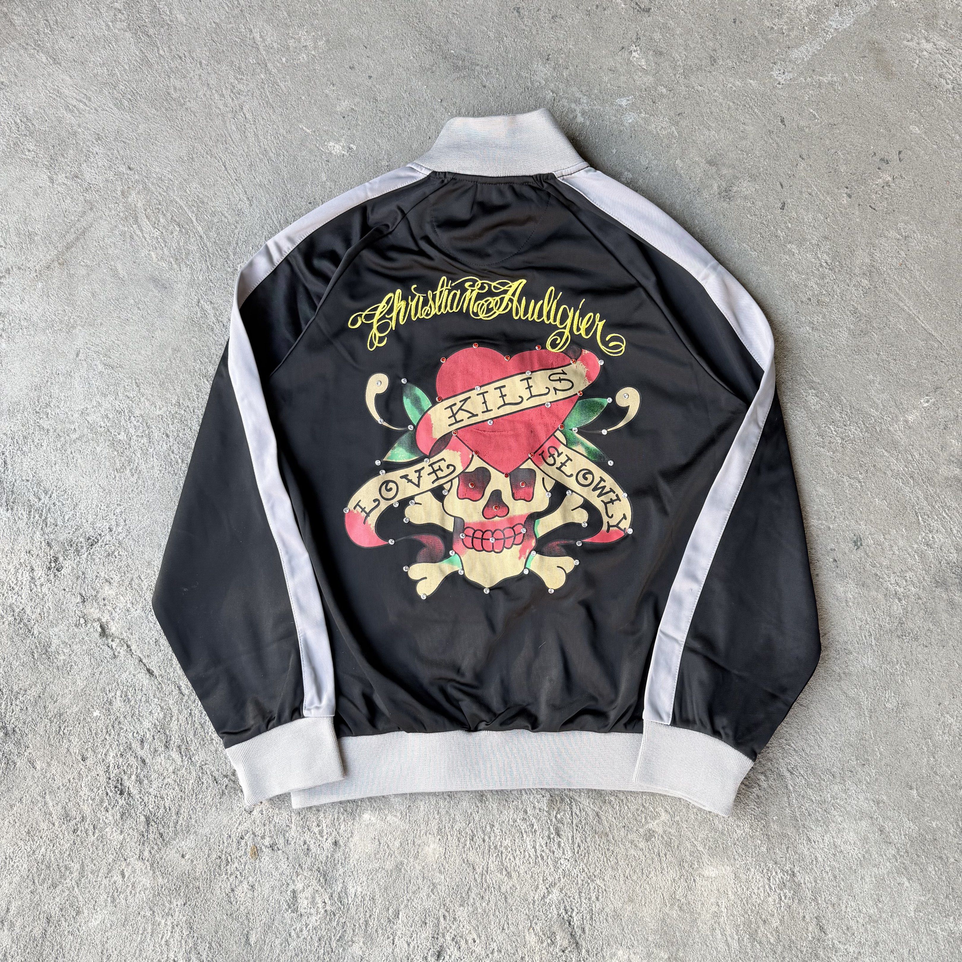 Ed Hardy Love Kill Skull Cubic Stone track jacket (Category: Coats, Jackets and Outerwear) located in Cavite. Submitted by shiro_____. (Listing ID 1432675543, Image 2). Description: For sale🔥 Ed Hardy Love Kill Skull Cubic Stone track jacket Size XL Length 26 Width 21 Excellent condition on its age Sign of usage only Still presentable.