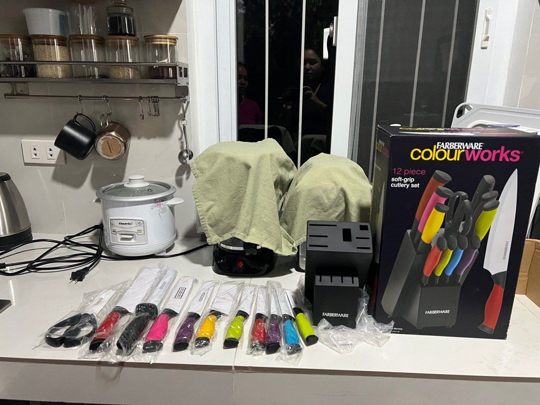 Farberware Colourworks 12-Piece Soft-Grip Cutlery Set (Category: Dinnerware & Cutlery) located in Imus. Submitted by caseyandalex (Listing ID 1432705934, Image 2). Description: - Farberware Colourworks 12-piece cutlery set - Includes knives with colorful soft-grip handles - Matching knife block included - Complete set with various knife types - Knives are individually wrapped - Ideal for any kitchen.