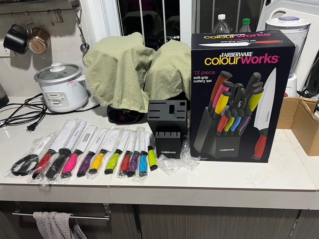 Farberware Colourworks 12-Piece Soft-Grip Cutlery Set (Category: Dinnerware & Cutlery) located in Imus. Submitted by caseyandalex (Listing ID 1432705934, Image 3). Description: - Farberware Colourworks 12-piece cutlery set - Includes knives with colorful soft-grip handles - Matching knife block included - Complete set with various knife types - Knives are individually wrapped - Ideal for any kitchen.