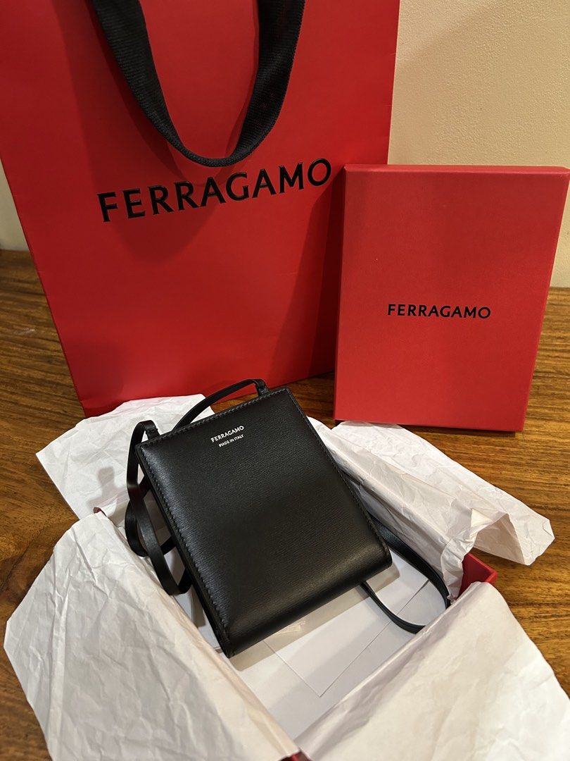 Ferragamo Calf Leather Card Holder (Category: Luxury Bags & Wallets) located in Paranaque City. Submitted by daftspect (Listing ID 1432736731, Image 1). Description: Ferragamo Black Calfskin Cardholder with Sling • RFS: Funds, not my style • Condition: Brand new in packaging, besides to take pictures • Can request further pictures • Price negotiable MOD: Meet-up, Lalamove MOP: GCash, bank transfer .